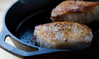 Thick pork chops with salt and pepper