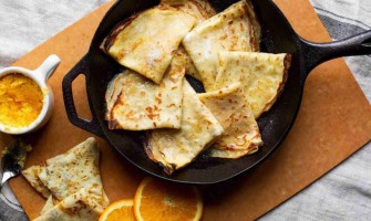Pancakes with orange butter and brandy